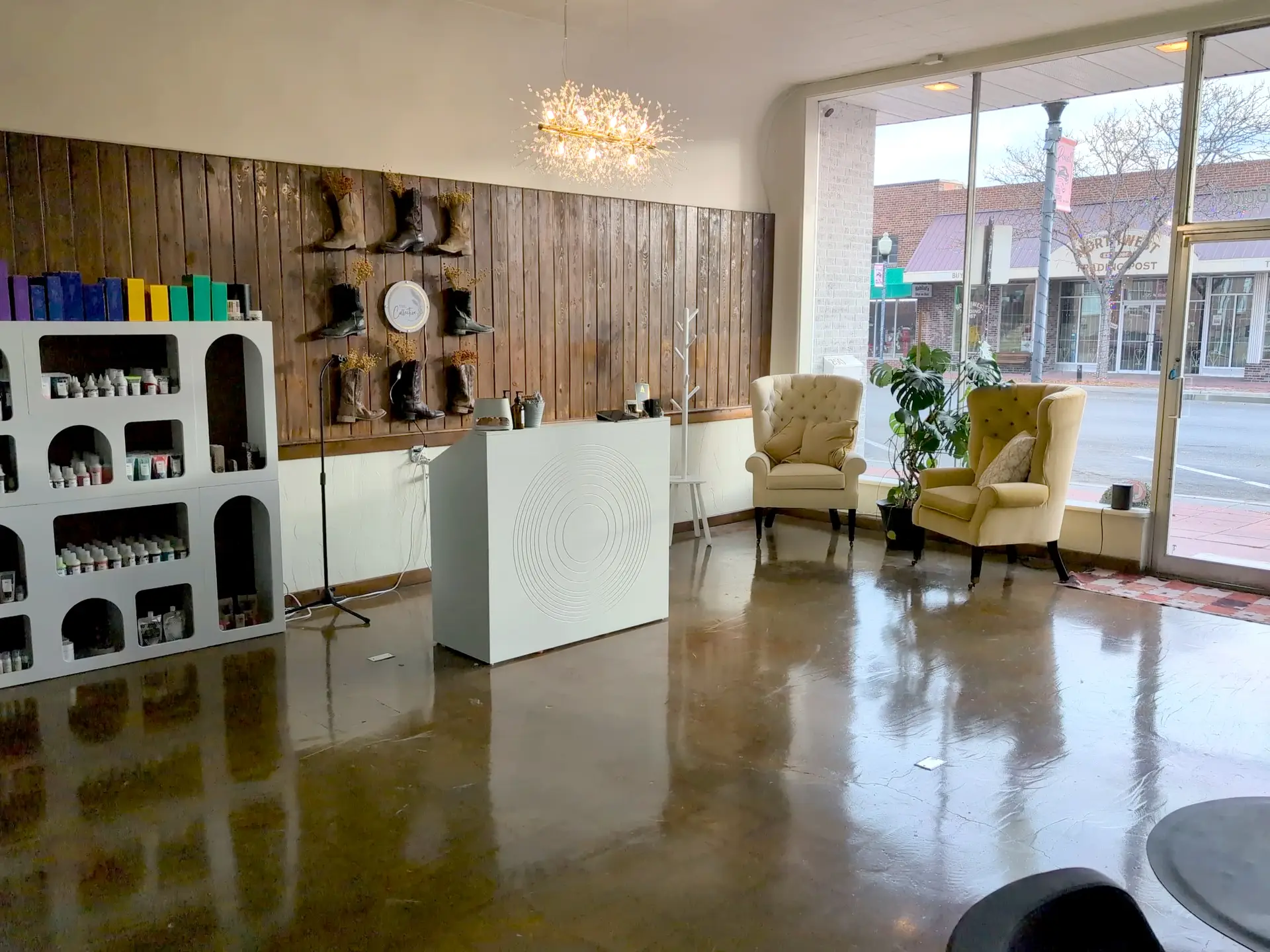 A beautifully refinished wood feature wall creates a warm, inviting first impression, showcasing Zenith Paint and Finish's expertise in commercial wood restoration and staining.